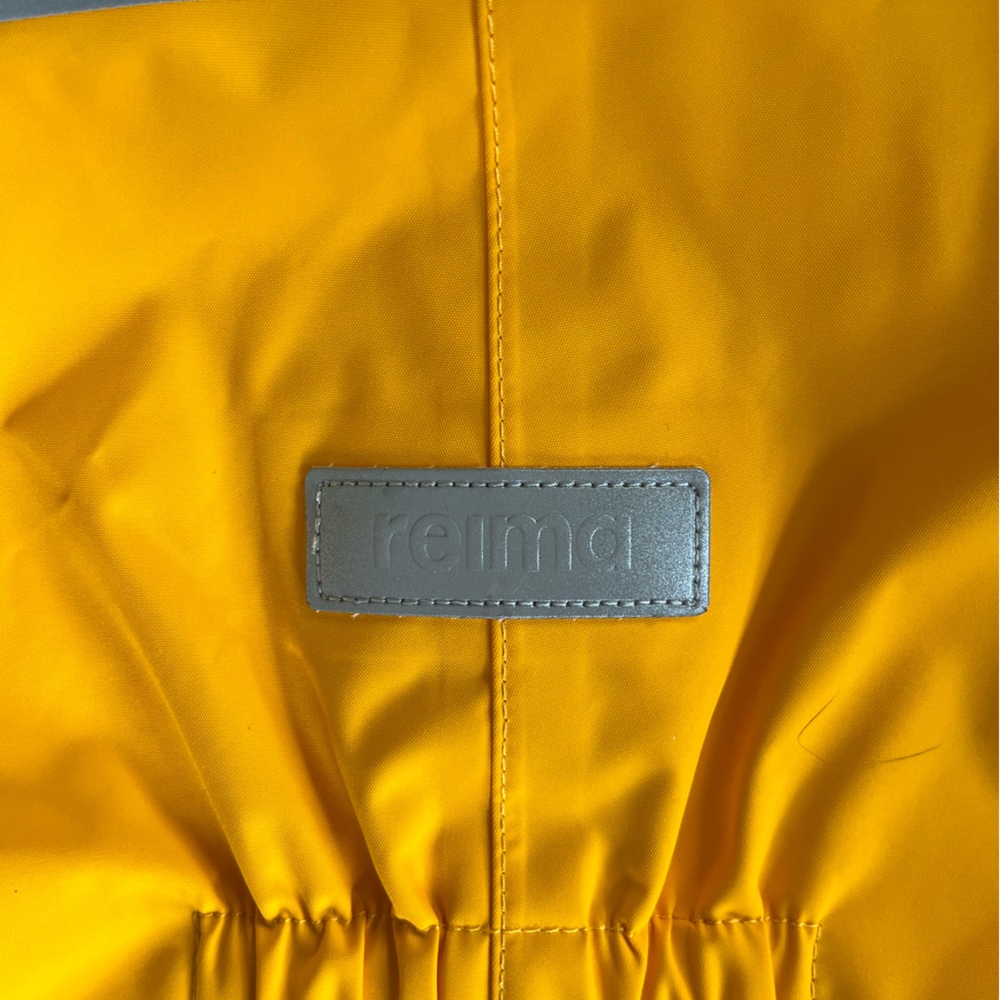 Reima tec size 74 baby/toddler waterproof snow suit in yellow with fuzzy hood.